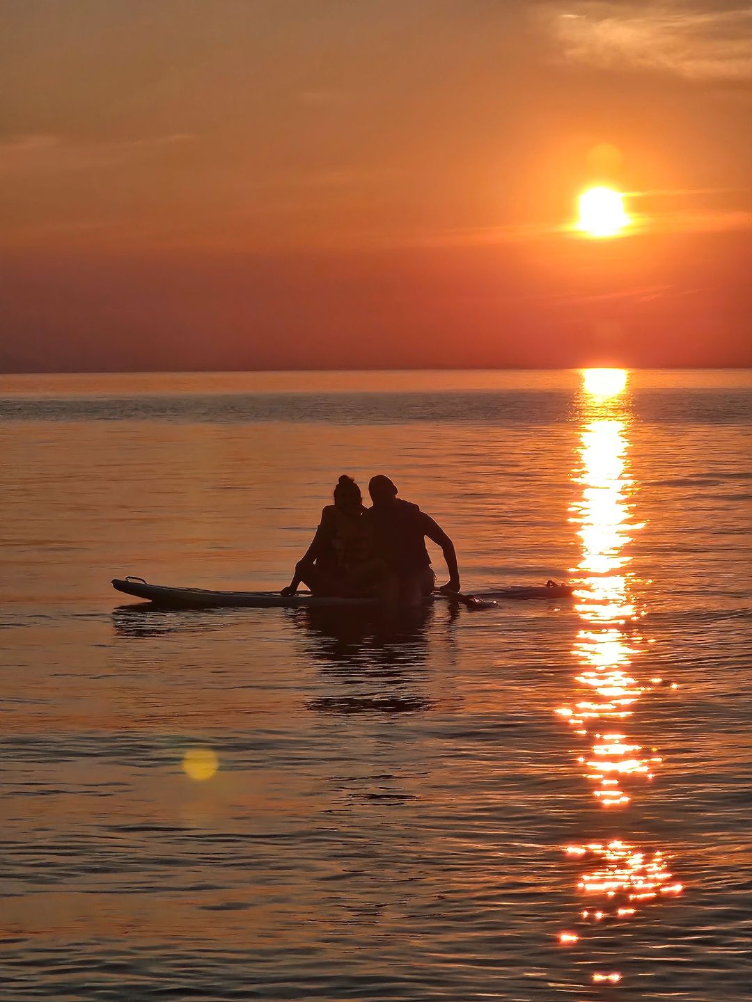 Paddleboarding at sunset